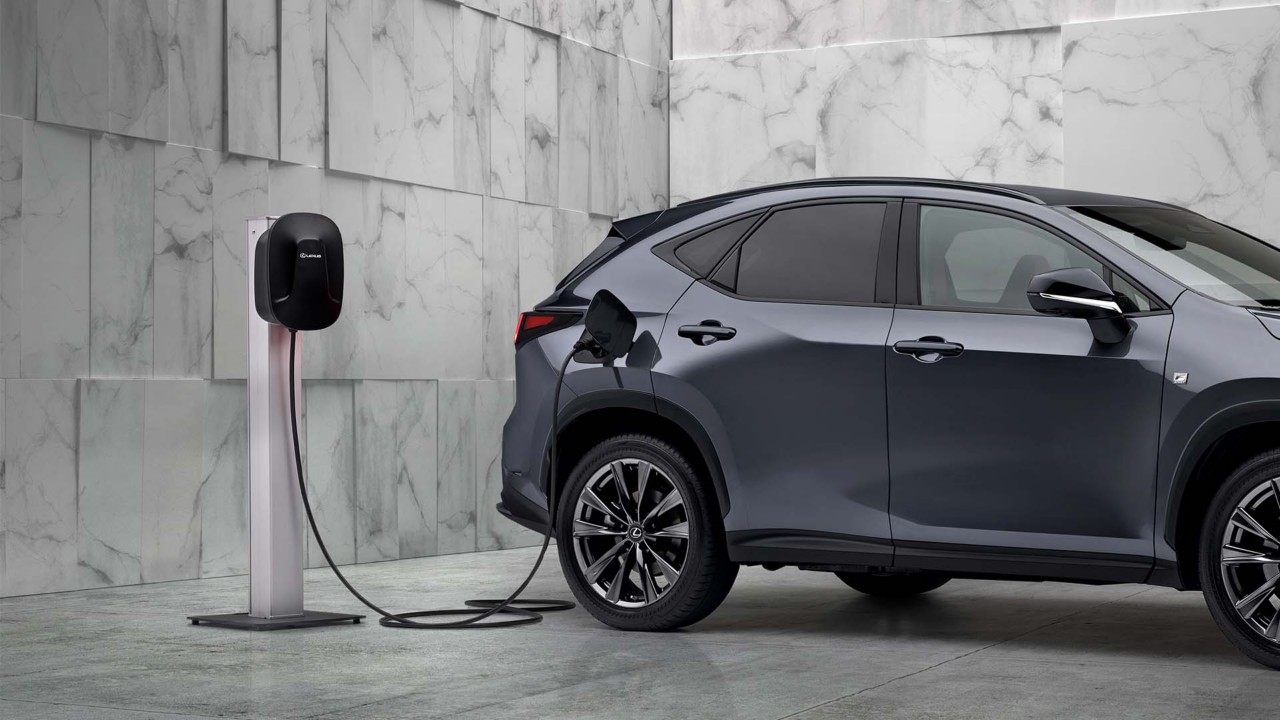 Lexus NX plugged into a charging station