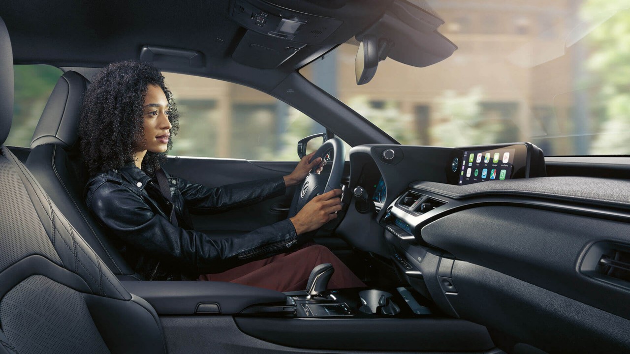 A person driving the Lexus UX300e