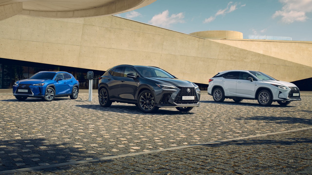 A parked Lexus UX 300e, Lexus NX 450h+ and Lexus NX 350h